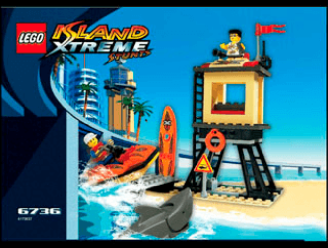 LEGO Island Xtreme Sports set packaging with lifeguard tower, boats, and palm trees on a blue background.